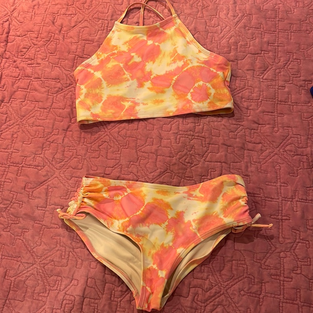 Pink and yellow to dye 2 per ice swim suit.